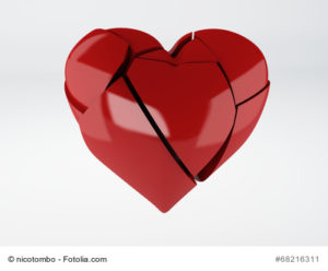 image of red broken heart om white background. 3d illustration